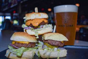 G-Sliders: beef sliders with cheese, tomato, onion, lettuce, pickles, mob sauce
